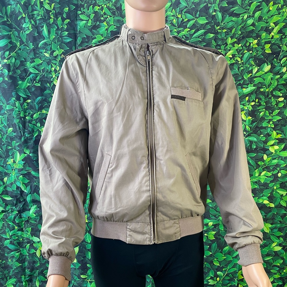 Member Only Jacket color tan size 42. Used